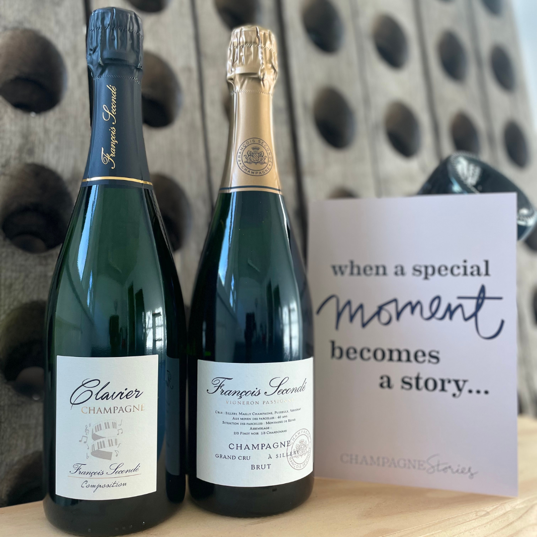 2 flasker champagne fra Champagne Francois Secondé, Clavier, Brut Grand Cru, - kort med teksten "when a special moments becomes a story.." Pupitre uskarpt i baggrunden
